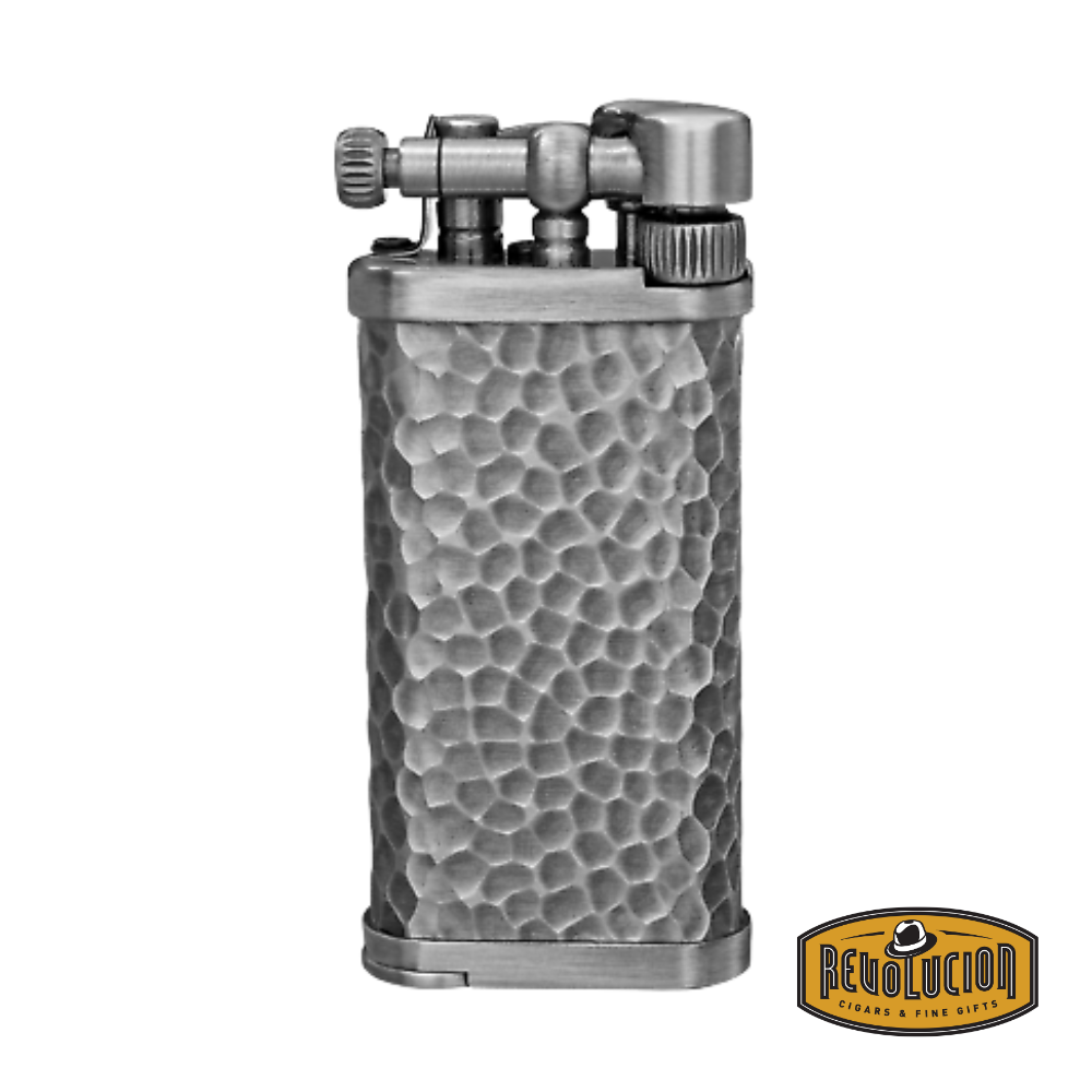 IM Corona Old Boy 7717 Pipe Lighter displayed from the front, highlighting its sleek dark finish and iconic flint-wheel ignition.