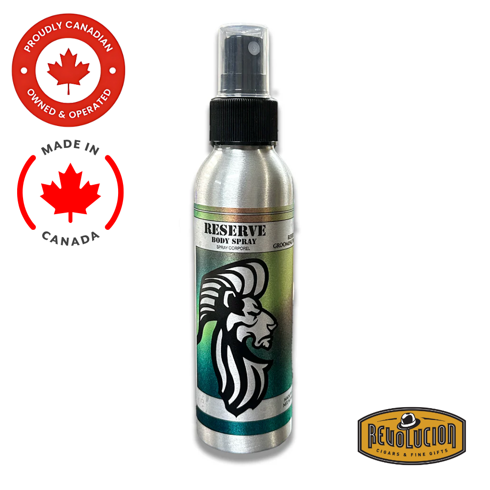 King & Country Reserve Body Spray in a sleek, dark cylindrical bottle with refined silver accents, designed to convey a sense of sophistication and masculine elegance.