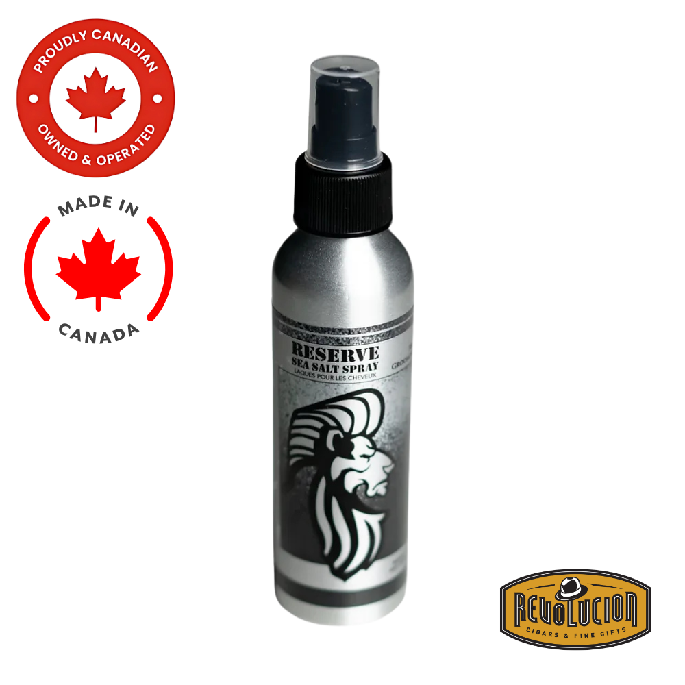 King & Country Reserve Sea Salt Spray in a sleek amber bottle with pump top, designed for adding texture and volume to hair with a natural matte finish.