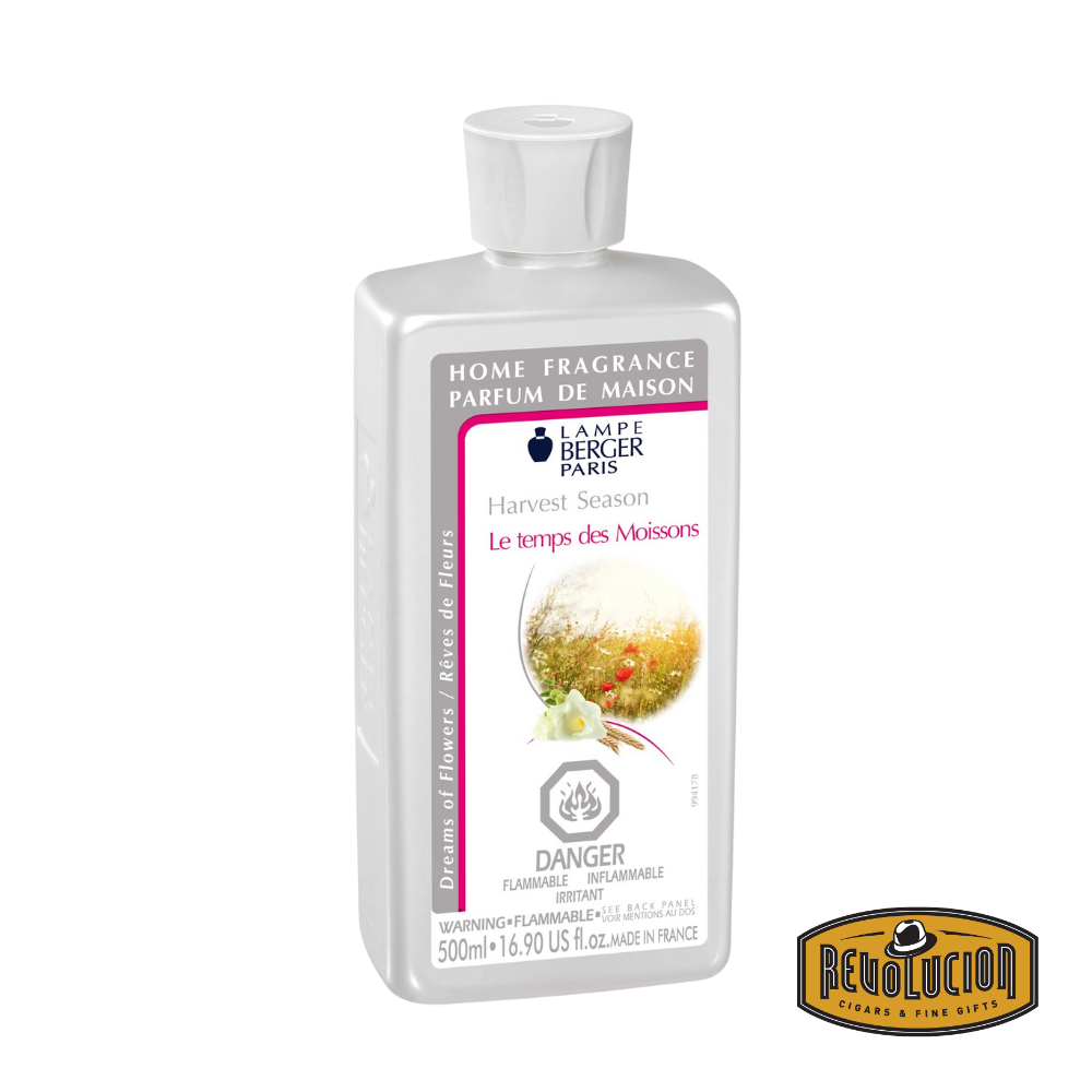 A Lampe Berger Refill bottle in the Harvest Season fragrance, capturing the essence of autumn with warm, earthy notes of ripe fruits, golden grains, and a hint of spice for a cozy and inviting atmosphere.