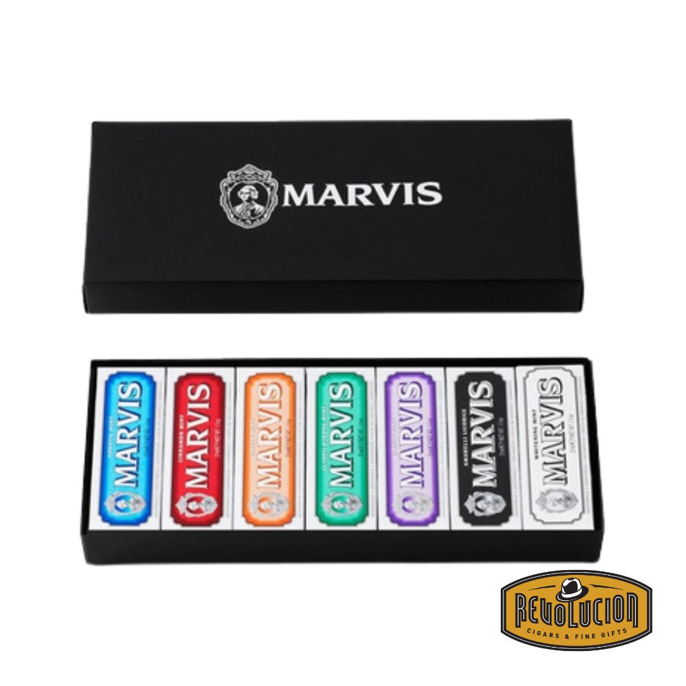 Front view of the Marvis 7 Travel Size Toothpastes Gift Box showcasing seven colorful toothpaste tubes neatly arranged in a sleek black presentation box.