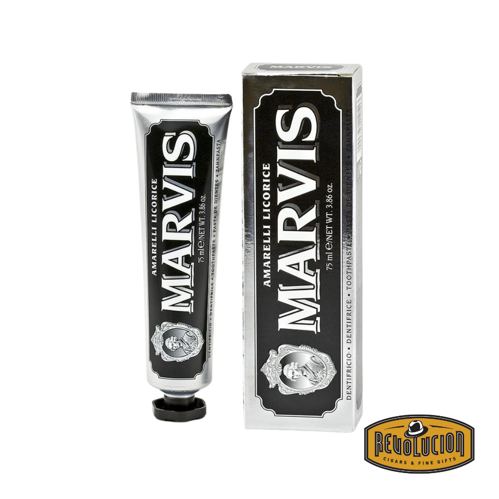Marvis Amarelli Licorice Toothpaste in a sleek silver and black tube, combining classic Italian design with a bold, aromatic licorice flavor for a refined brushing experience.