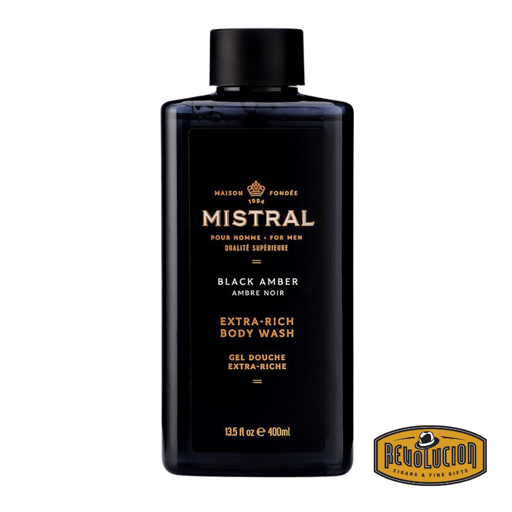 Mistral Men's Extra Rich Body & Hair Wash in Black Amber scent, featuring a dark, moody bottle with gold details and an aura of deep sophistication.