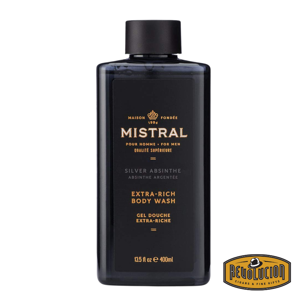 Mistral Men's Extra Rich Body & Hair Wash in Silver Absinthe scent, shown in a bold, metallic-inspired bottle with cool green accents and an avant-garde design.