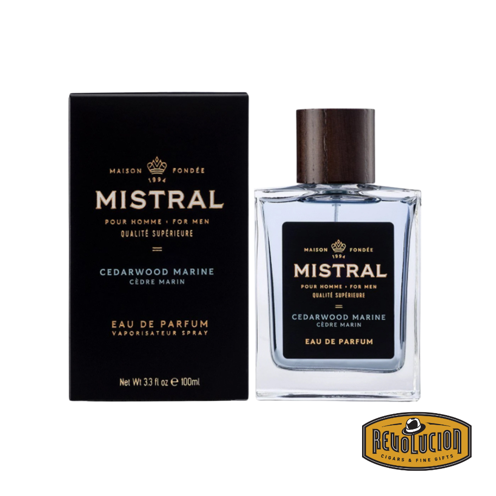 Mistral Cedarwood Marine Eau De Parfum – A refreshing and masculine fragrance blending crisp marine notes with warm cedarwood, presented in an elegant glass bottle with a refined wooden cap.