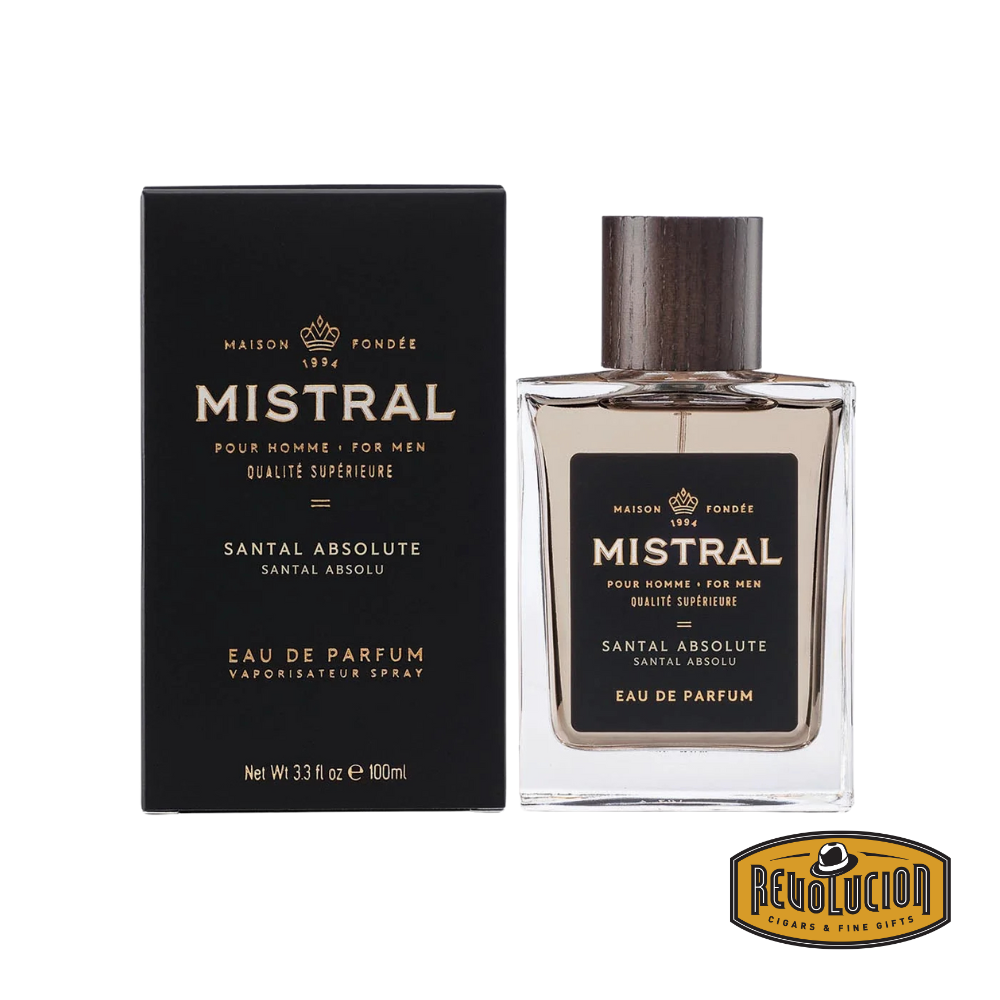 Mistral Santal Absolute Eau De Parfum – A rich and elegant men's fragrance featuring deep sandalwood, warm spices, and subtle citrus notes. Presented in a sleek glass bottle with a refined wooden cap and premium packaging.