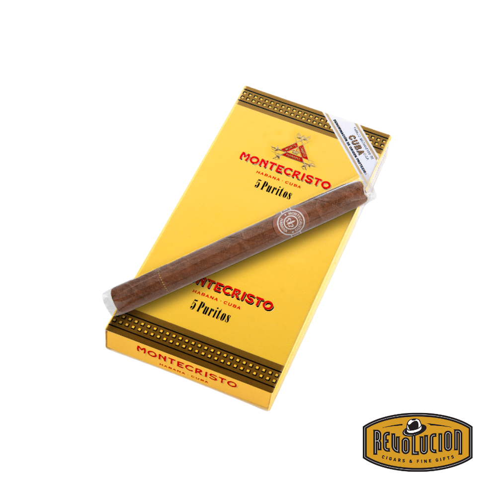 Montecristo Puritos Medium-Full Strength Cuban Cigarillo box opened to reveal individually wrapped puritos, each featuring the classic Montecristo band and yellow box design with the iconic crossed swords logo.