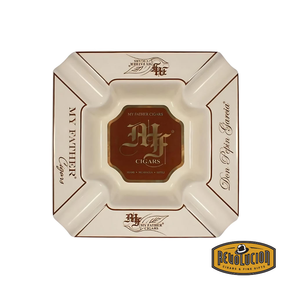 Top view of the My Father Cream Ashtray, showcasing its elegant cream finish, gold accents, and the My Father Cigars logo, displayed with the Revolucion Cigars &amp; Fine Gifts logo.