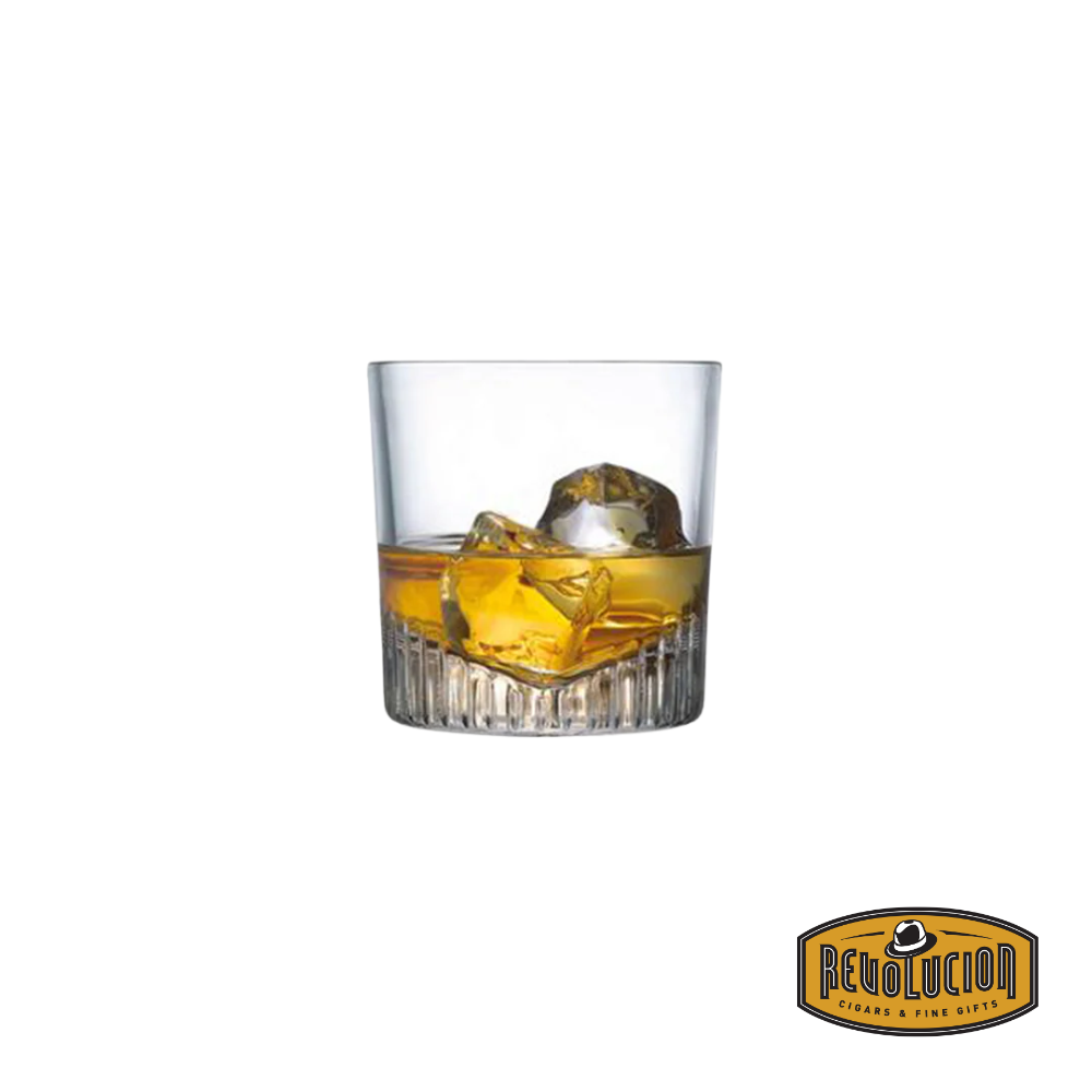 Nude Caldera Whisky Glass with liquid, showcasing its refined contours and perfect size for enjoying whiskey, enhancing the drinking experience with sophistication.