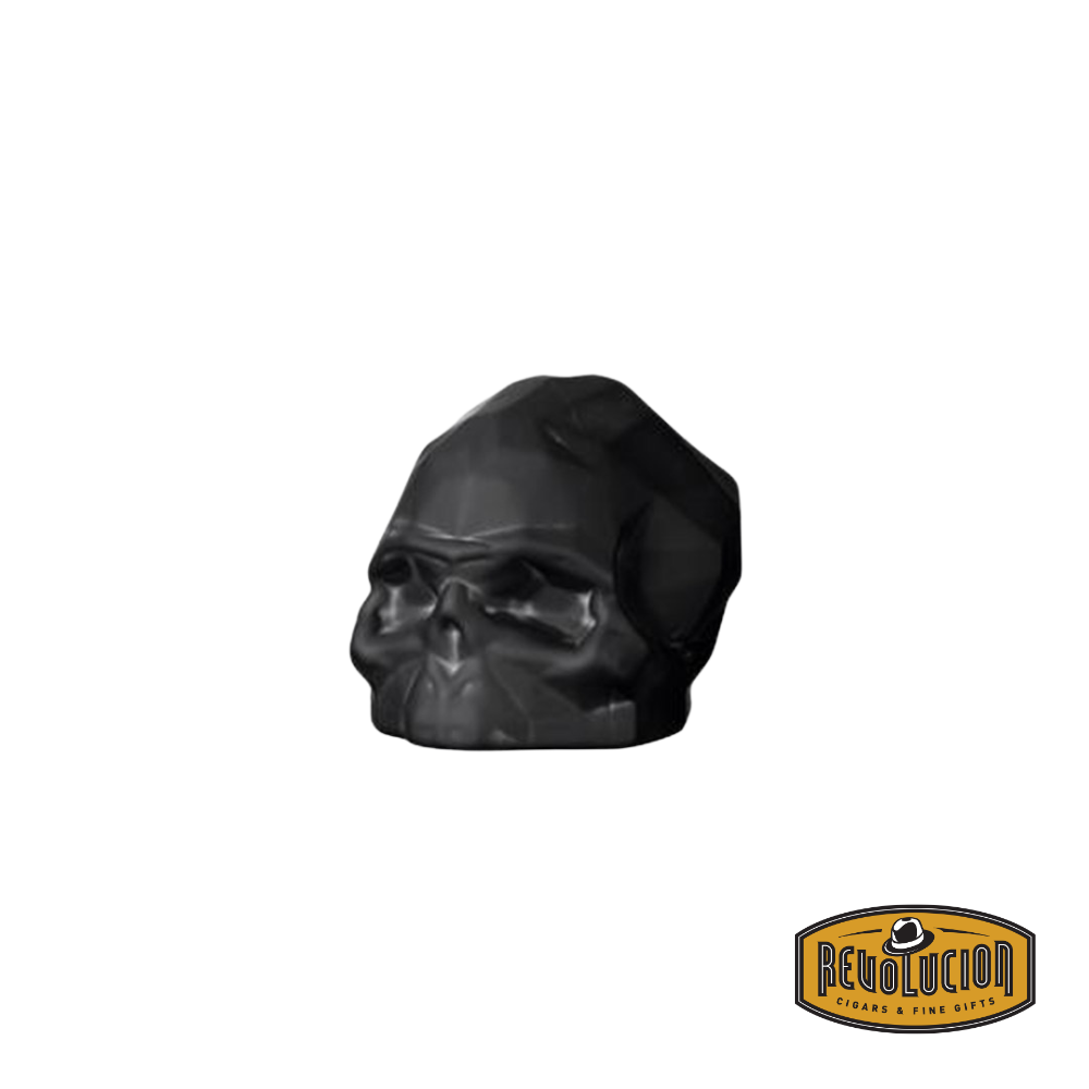 Nude Memento Mori Faceted Skull Paperweight in Sandblasted Black, showcasing a textured matte finish with detailed geometric facets for a modern and stylish aesthetic.