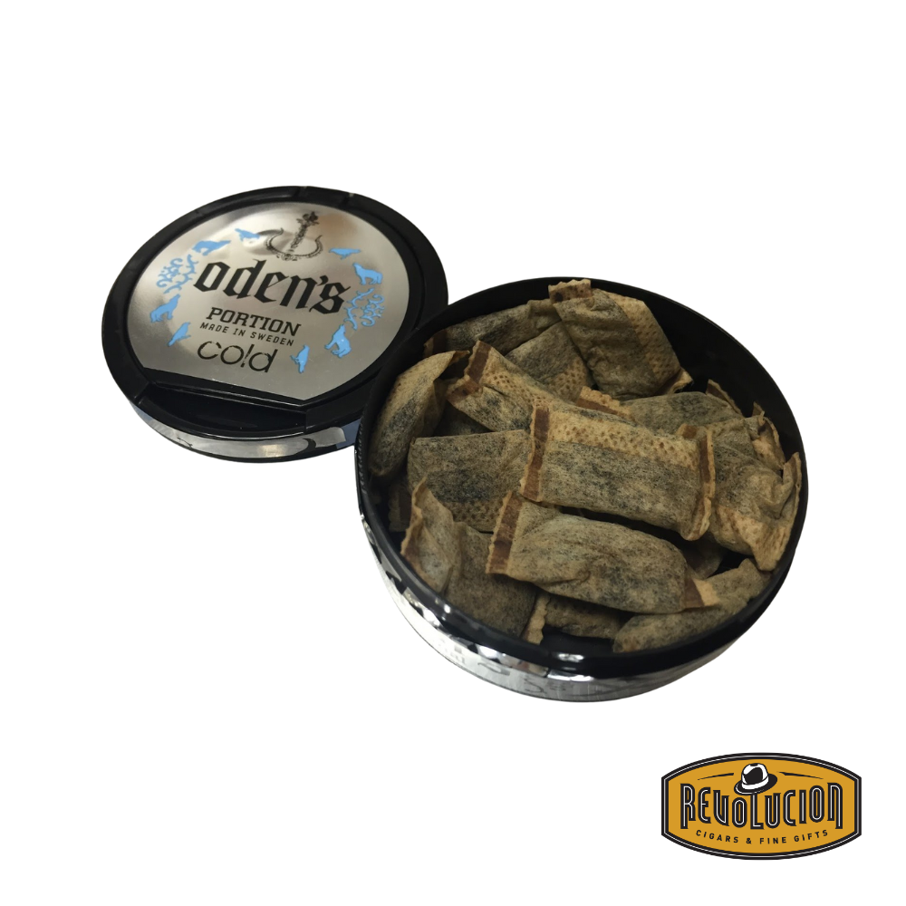 Opened can of Oden's Cold Portion Snus, revealing neatly packed portion bags inside.