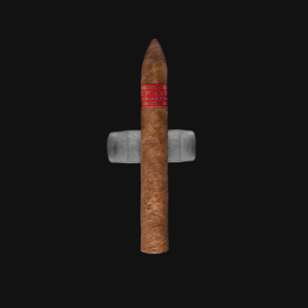 Front view of a single Partagás Serie P No.2 Torpedo cigar with a rich brown wrapper and red band, placed upright on a stand against a black background.