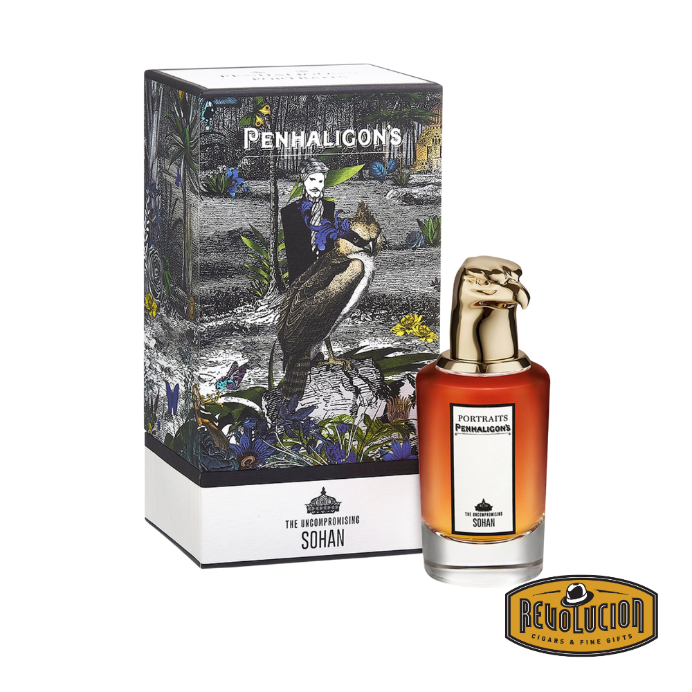 Penhaligon’s The Uncompromising Sohan Eau de Parfum bottle alongside its luxurious packaging, featuring an intricate design and signature gold animal head cap.