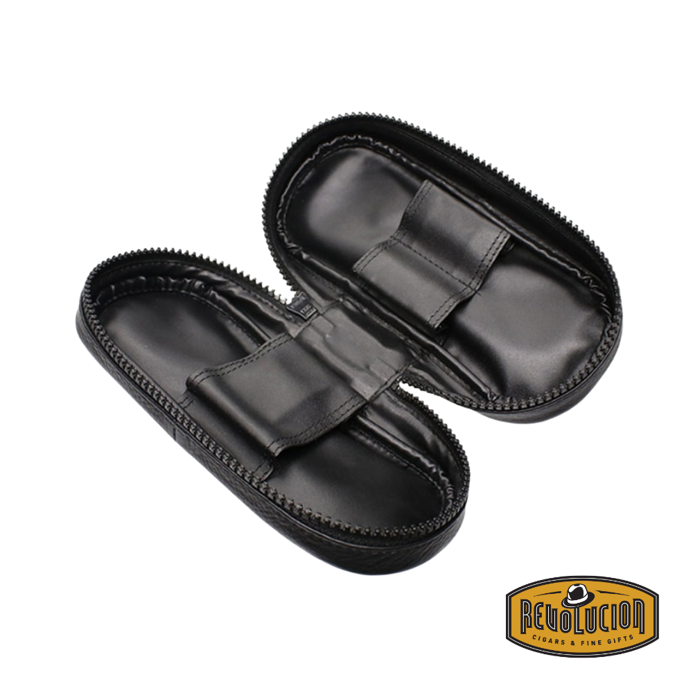 Opened Peterson Classic 2 Pipe & Tobacco Pouch, revealing compartments for pipes and tobacco storage.