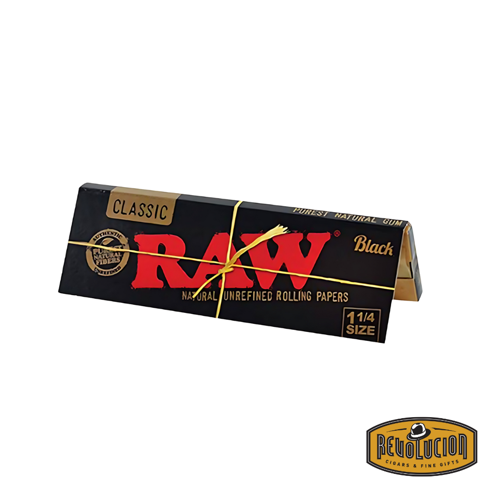 Raw Black Rolling Paper 1-1/4" – a pack of 50 ultra-thin, unbleached leaves designed for a slow and even burn.