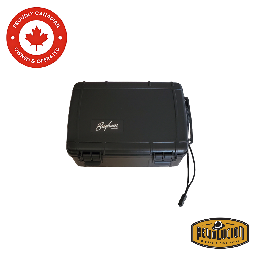 Revolucion Travel Humidor 14 Count, a compact and durable travel-friendly humidor with a sleek black exterior, designed for secure cigar storage on the go.