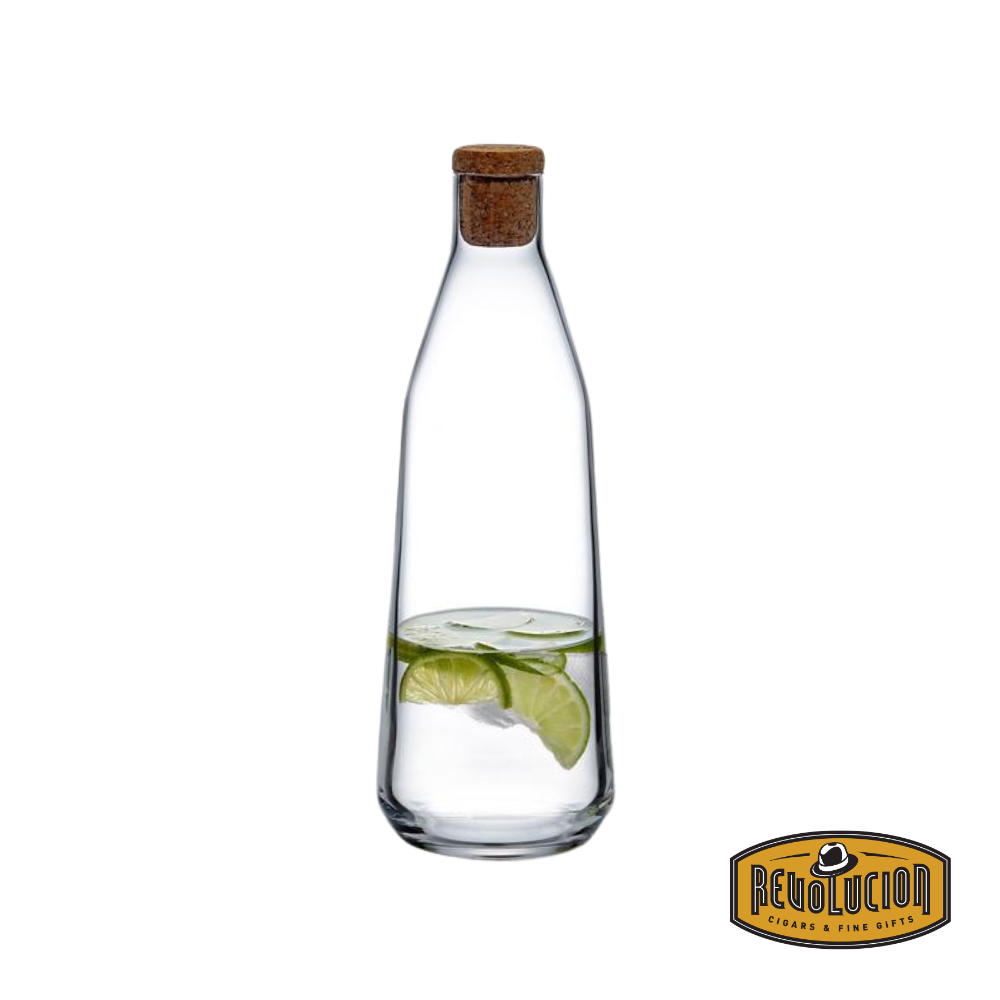 Nude Ryth Water Carafe filled with lemon-infused water, featuring a sleek and modern glass design perfect for serving refreshing beverages.