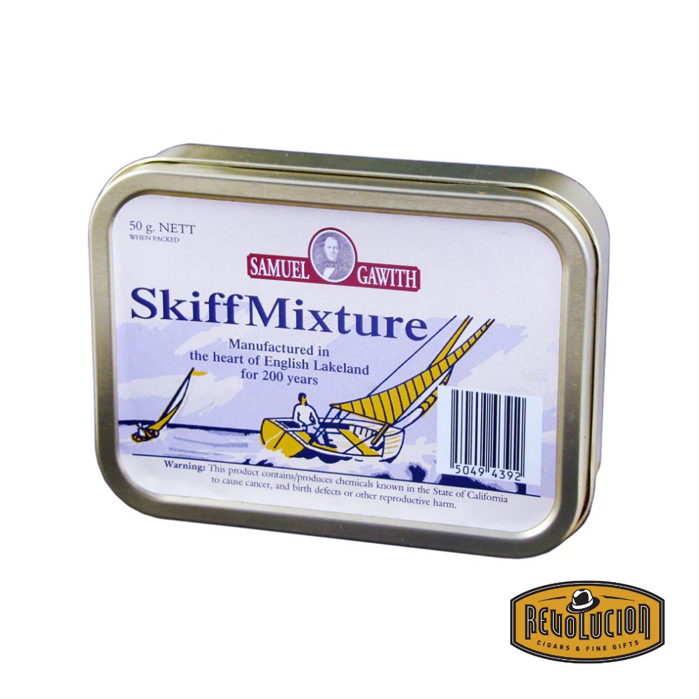 Image of a Samuel Gawith Skiff Mixture Pipe Tobacco tin. The label showcases a nautical theme, with a sailing ship illustration, brand name, and blend details. The Revolucion logo is in the corner.