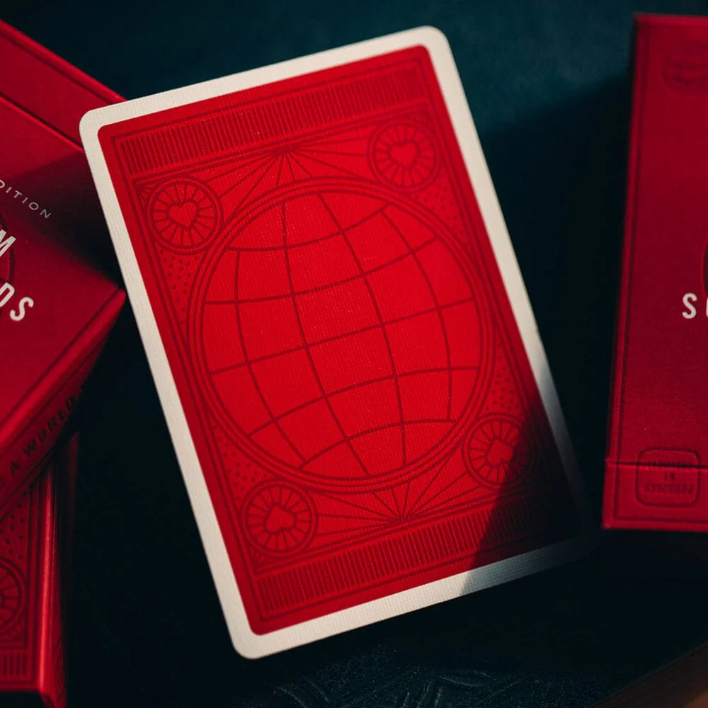 Striking red playing card from the Theory 11 Product Red deck displayed against a matching red-themed background.