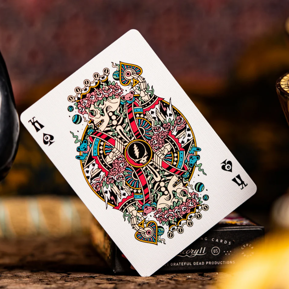 King card from the deck featuring a vibrant, colorful skull design inspired by the Grateful Dead.