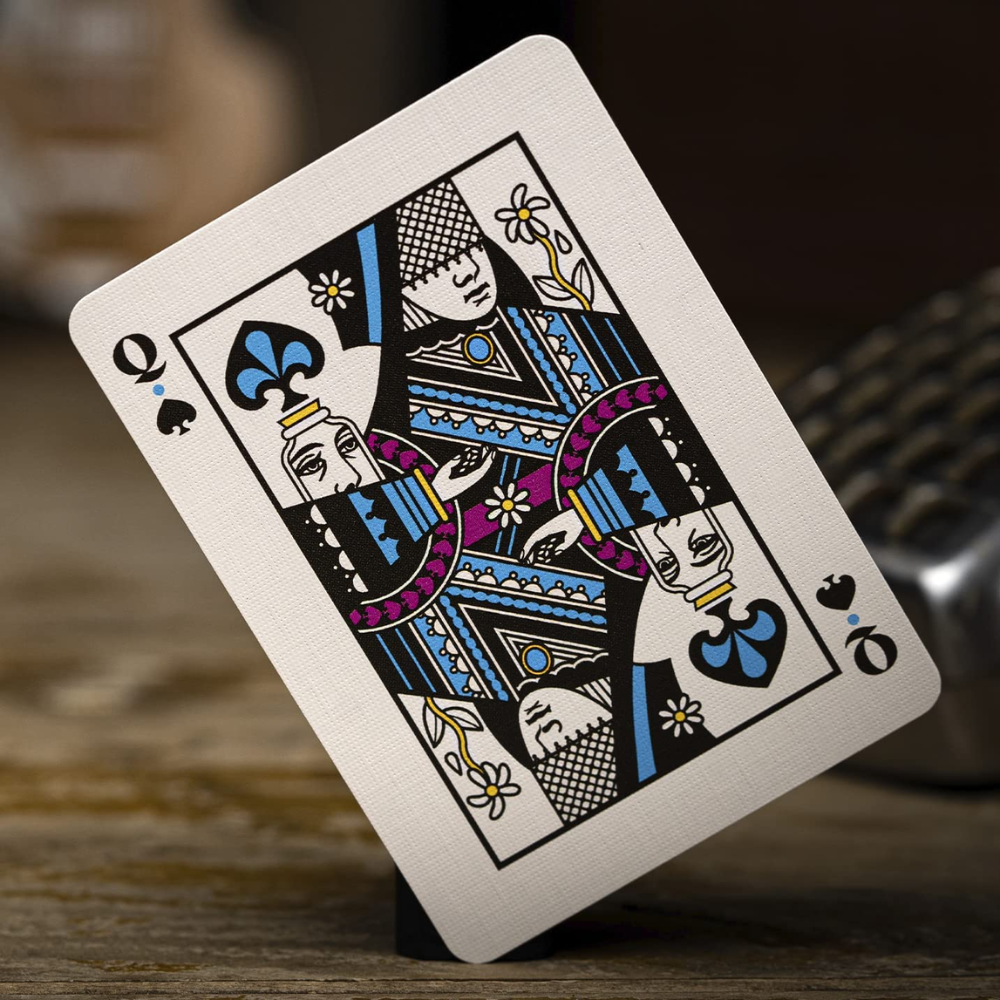 Queen of Hearts card from Theory 11 Beatles Playing Cards Green Edition, illustrated as Yoko Ono in detailed Sgt. Pepper-inspired attire.