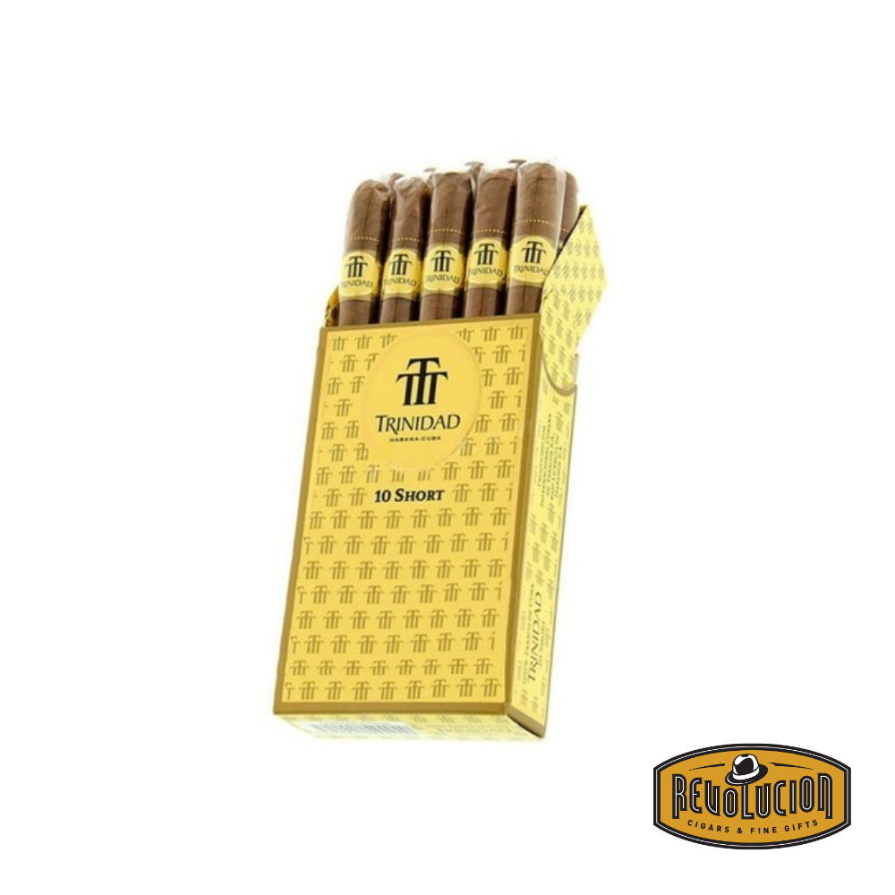 An open box of Trinidad Shorts medium-strength Cuban cigarillos, revealing several neatly arranged cigarillos inside the original gold and brown packaging.