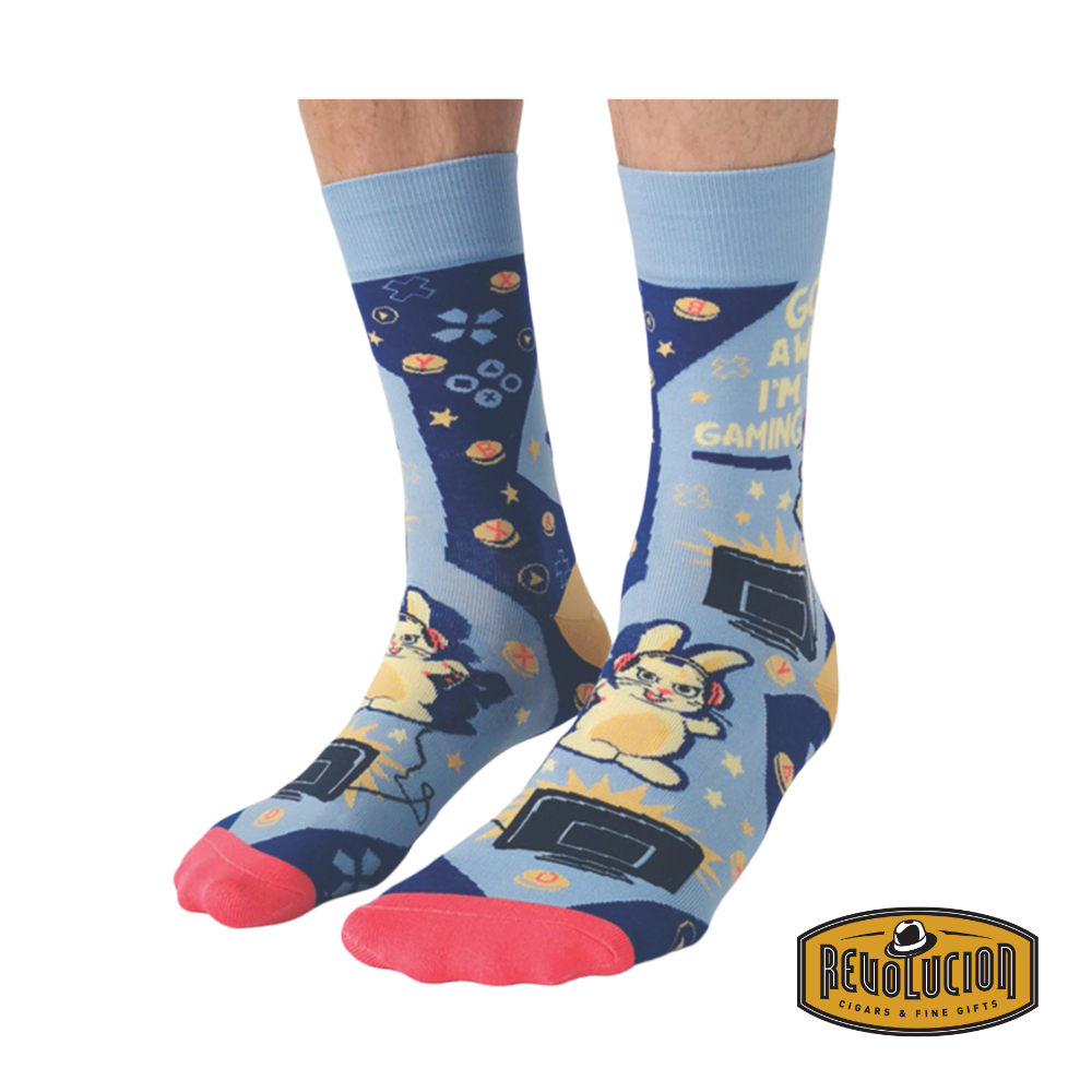 A pair of Uptown calf-length cotton unisex socks with a playful gaming theme. The design features classic gaming controllers, pixelated icons, and vibrant colors, perfect for video game enthusiasts.