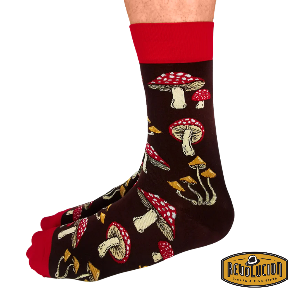 Side view of Uptown Mushroom Magic calf-length cotton unisex socks featuring a whimsical mushroom pattern on a soft fabric.