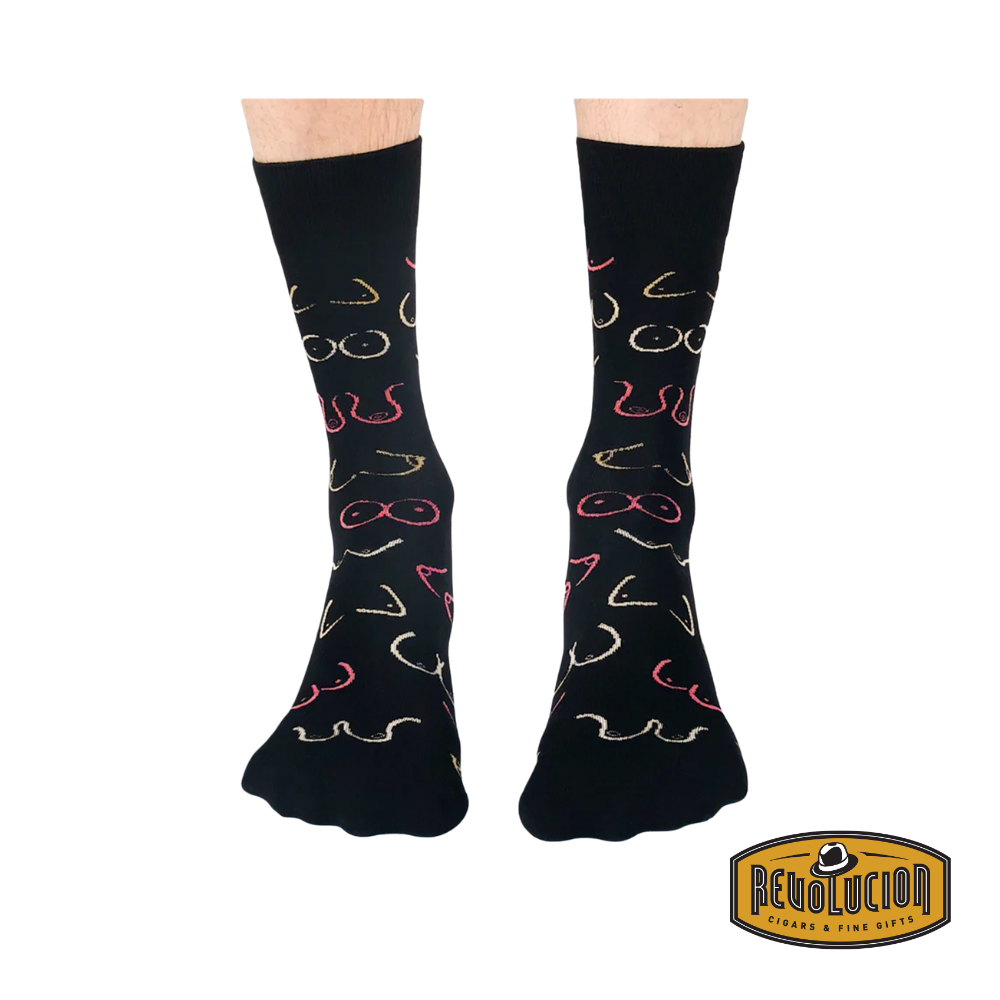 Uptown Simply Breast calf-length cotton unisex socks, front view, featuring a playful breast cancer awareness design with pink accents.