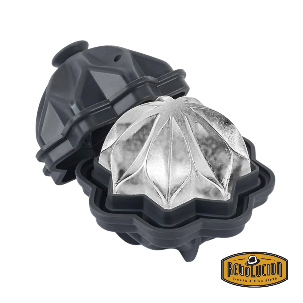 W&P Ripple Ice Cube Tray in charcoal, opened to reveal a single large ripple-textured ice cube inside.