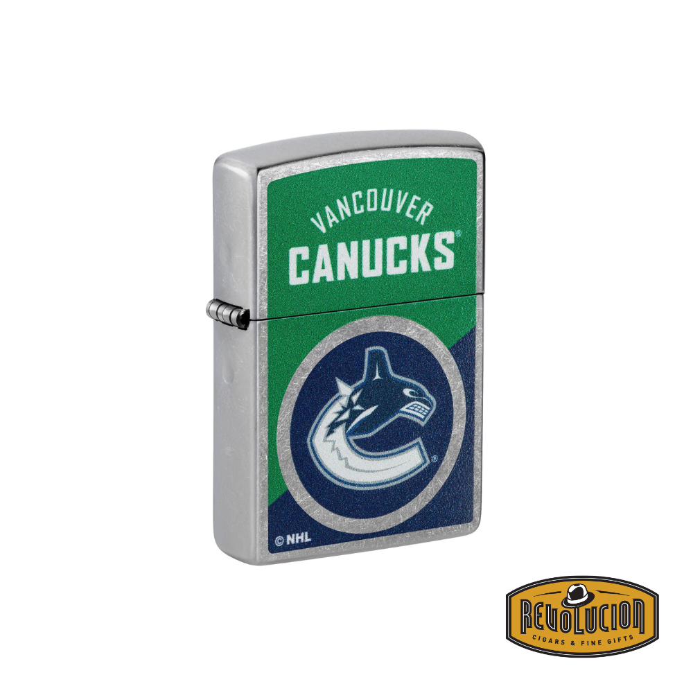 A closed Zippo lighter with the Vancouver Canucks logo and team colors on the front, showcasing its durable metal casing.