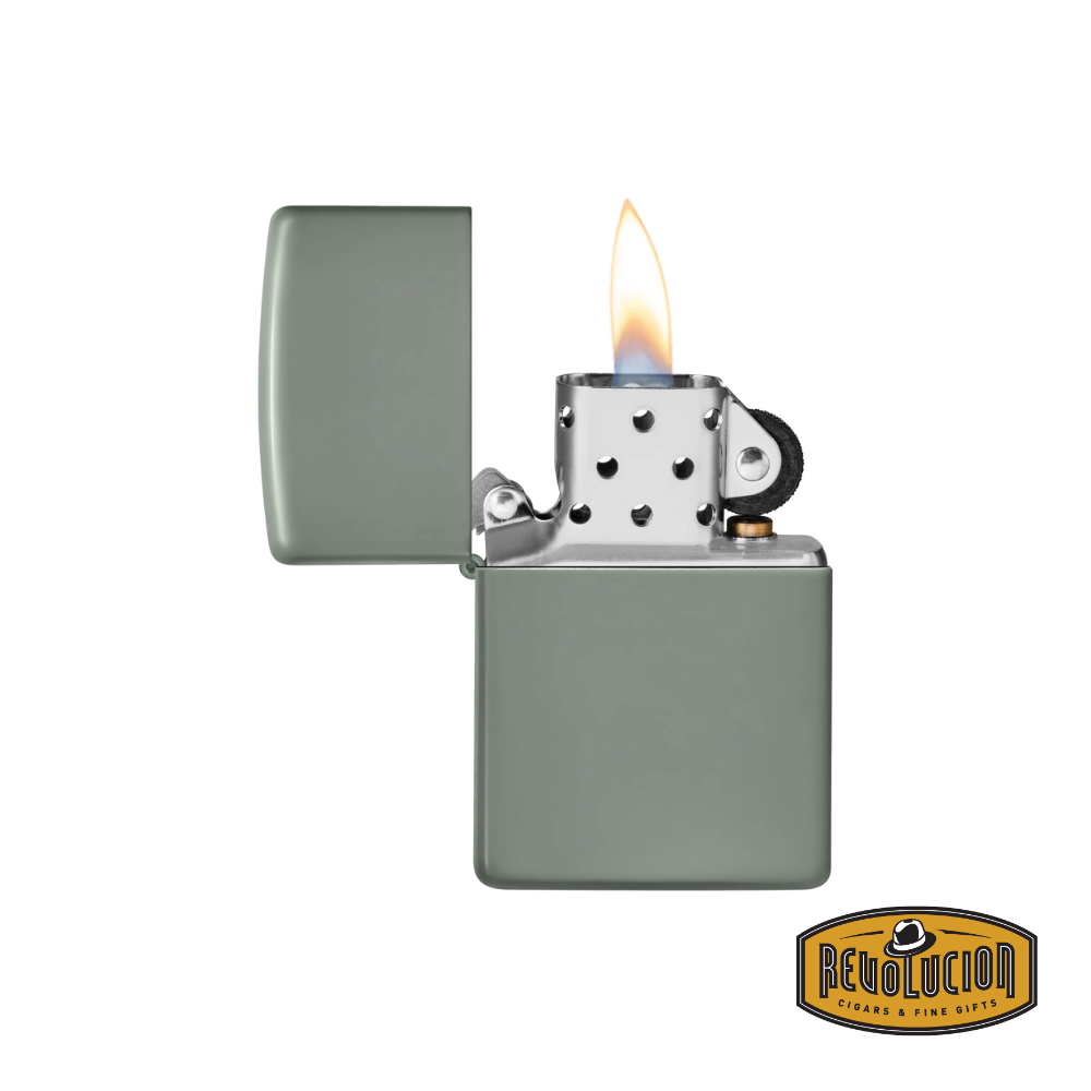 Zippo Sage Green lighter opened, showing the classic windproof design with a lit flame.