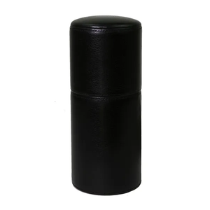 A closed black leather cylindrical desk humidor with a smooth, seamless design that ensures a perfect seal to maintain cigar humidity. The cylindrical shape is elegant and space-efficient, suitable for placement on a desk or shelf
