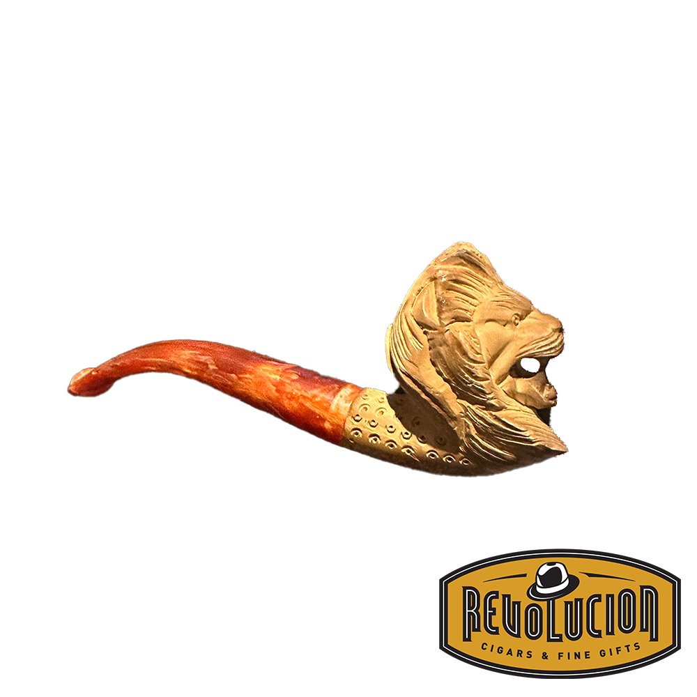 Profile view of a Meerschaum smoking pipe showcasing a detailed lion head carving and a red marbled stem. The bowl has an elegant lattice finish, highlighting the craftsmanship.