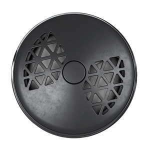 The photo shows the front of the Maison Berger Smart Car Diffuser, featuring a sleek and modern design in tones of black and gunmetal. The device has small triangular openings that form a geometric pattern reminiscent of a bowtie. The device is turned to the left, indicating a lower fragrance intensity.