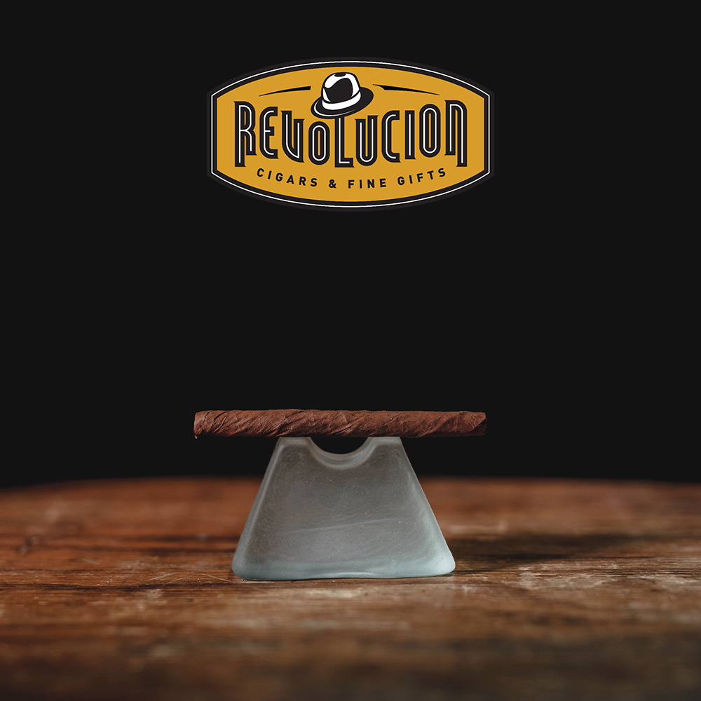 Side view of a Montecristo Club Mild-Medium Strength Cuban Cigarillo, displaying its compact and smooth finish.