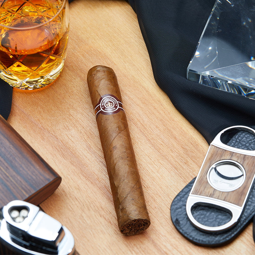 Montecristo Edmundo Cuban Cigar - Front View: A premium Montecristo Edmundo cigar with a rich brown wrapper and the iconic Montecristo band, showcasing its flawless construction.
