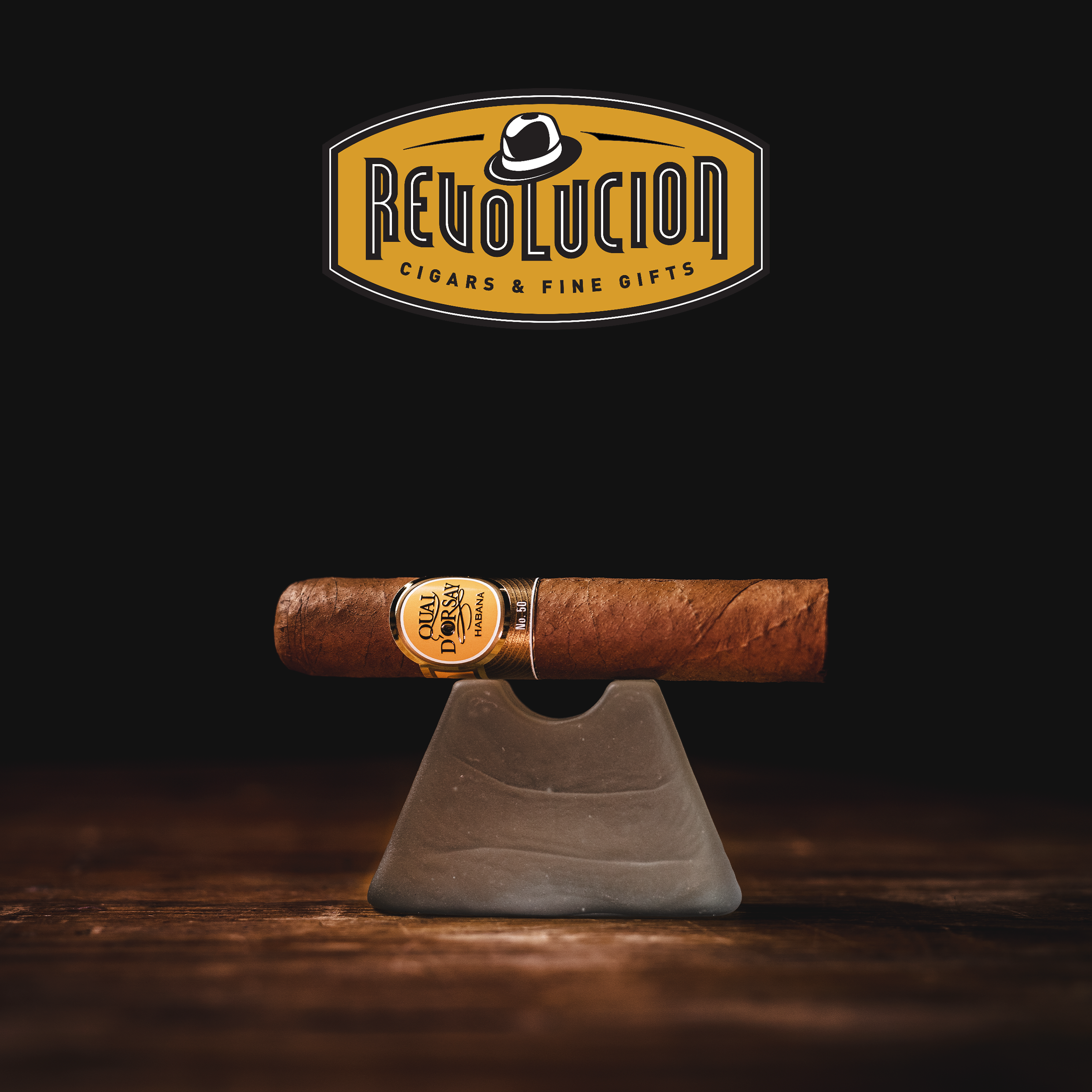 Side view of Quai D'Orsay No. 50 Petit Robusto Cuban Cigars, showcasing their compact size and flawless construction.