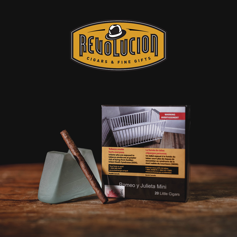 A simple, plain packaging box containing the cigarillos, offering a clean and minimalistic presentation.